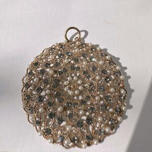 Gold, pearl, & blue stone mesh pendant